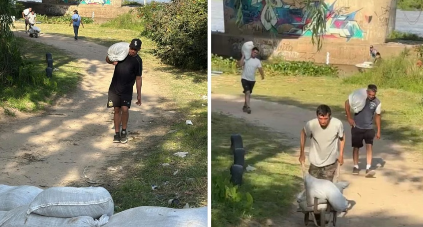 Los vecinos de Colastin&eacute; Sur colocan bolsas de arena para protegerse ante la crecida del r&iacute;o